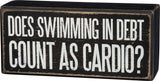 Primitives Swimming In Debt Box Sign